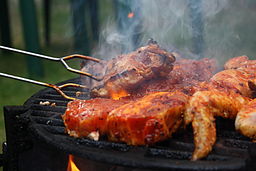 Grilled_steaks_turned_by_grill_tongs_in_Czech_Republic-2.jpg